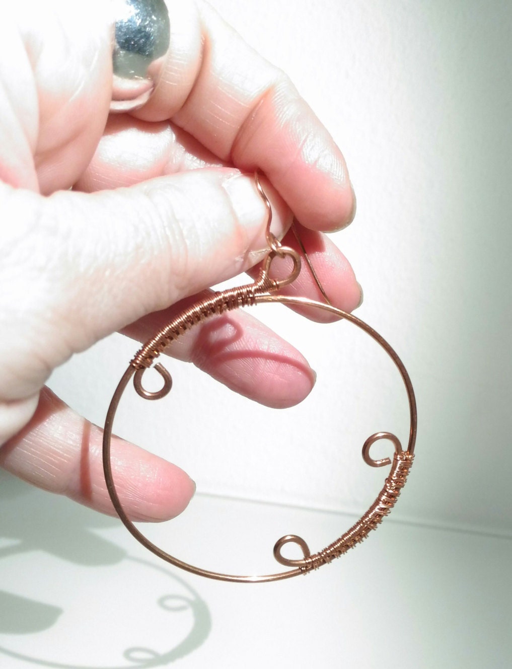 Big copper dangle earrings. Round hammered earrings with spiral. Copper jewelry